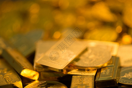 堆叠的金币家庭理财堆叠金币和金条背景