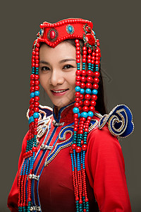 头饰成年人漂亮的人穿着蒙古族服饰的女人背景图片