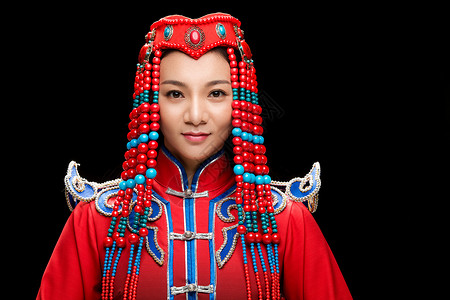 幸福亚洲头饰穿着蒙古族服饰的女人图片