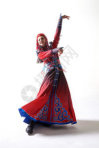 微笑少数蒙古人传统服装动态动作穿着蒙古族服饰的女人背景