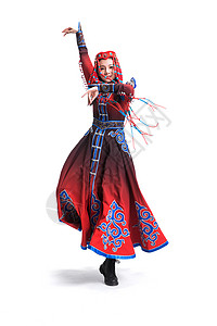 舞蹈风格素材色彩鲜艳户内舞蹈穿着蒙古族服饰的女人背景