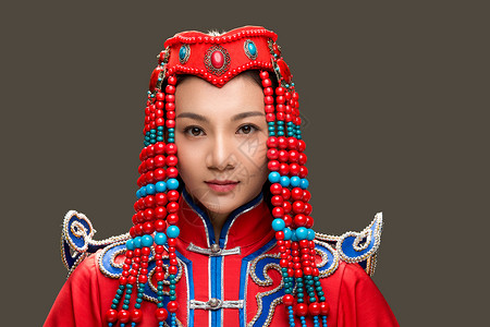 半身像56个民族青年人穿着蒙古族服饰的女人背景图片