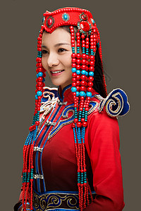 穿着蒙古族服饰的女人背景图片