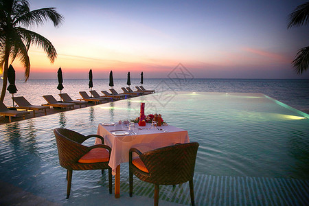 岛屿度假夜景摄影度假胜地桌子马尔代夫海景风光背景