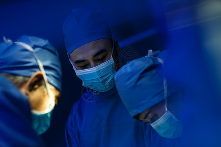 医护服老年人医疗医务工作者在手术背景图片