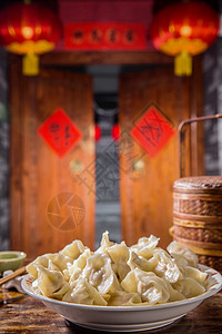 竹篮元素东方门口团圆饭春节吃饺子背景