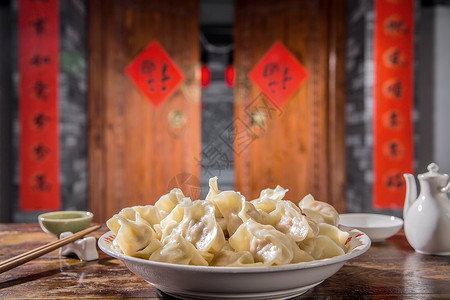 酒壶元素生食彩色图片新年春节吃饺子背景