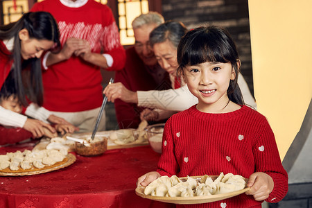 食品前景聚焦新年前夕幸福家庭过年包饺子图片