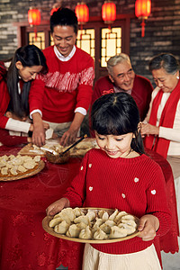 冬季小孩元素半身像年夜饭五个人幸福家庭过年包饺子背景