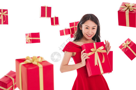 礼品盒美女快乐漂亮的青年女人拿着礼物图片