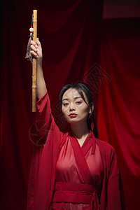 中国风美女手拿笛子形象图片