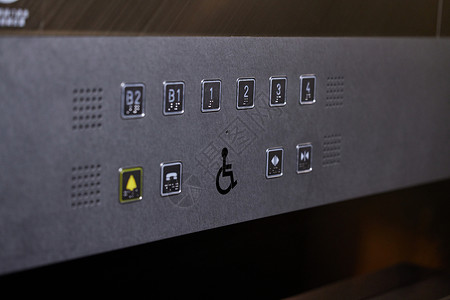 关爱残疾人字体电梯上的按键背景