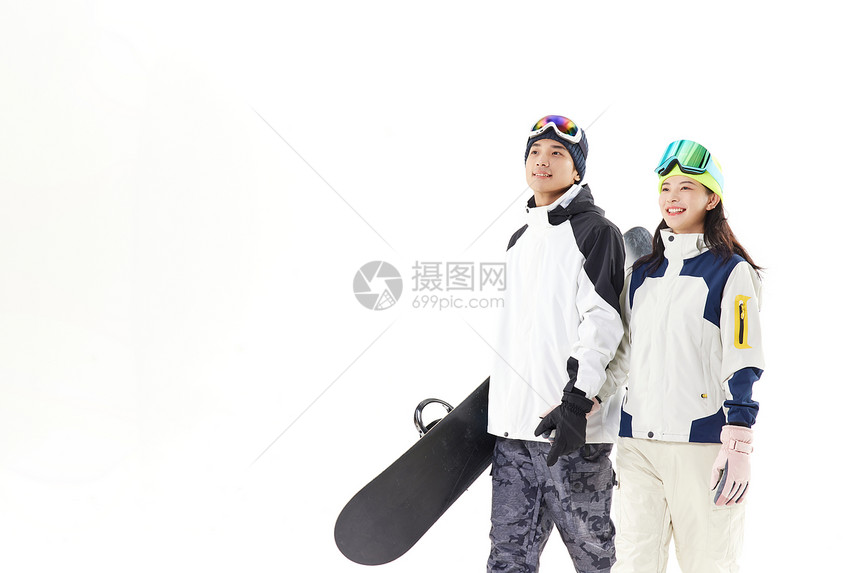 年轻情侣相约一起滑雪形象图片