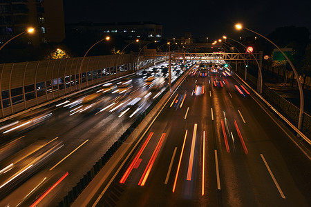 路速度夜晚的城市车流背景