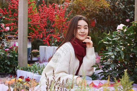 花市年轻女性花卉市场采购鲜花背景