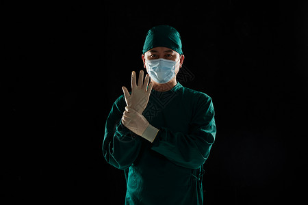 戴手套的手术医生形象图片