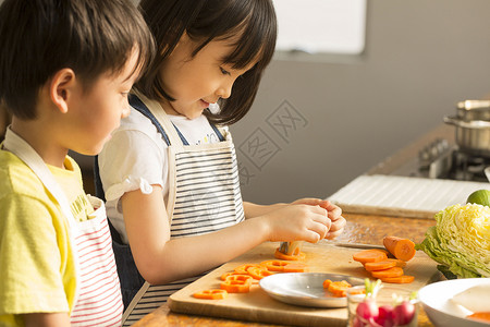切瓜的男孩小孩学习烹饪背景