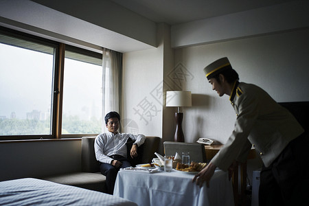 进店就送酒店客房服务人员送早餐进房间背景