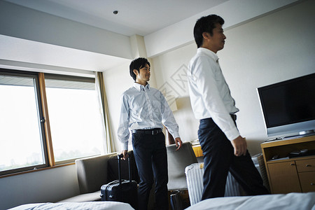 入住酒店的中年男子公司职员高清图片素材