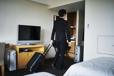 酒店房间准备离开的商人职业高清图片素材