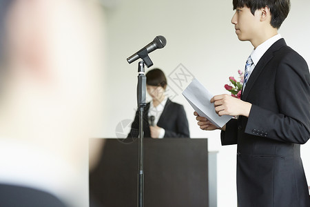 商业开幕典礼男职员上台演讲背景