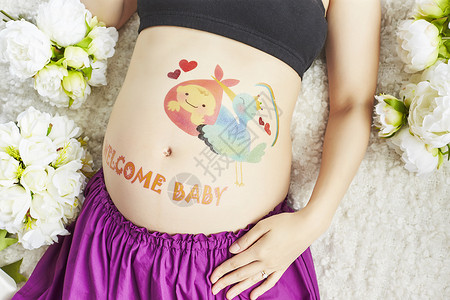 孕妇孕肚艺术照背景图片