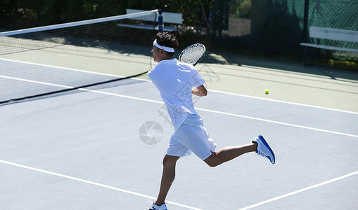 网球选手专业人物网球服打网球的人背景