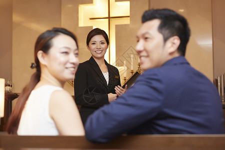 职业女亚洲人酒店婚礼策划师图片