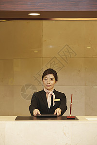 女白领女孩商务在酒店接待处工作的女人背景图片