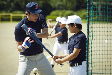 4号选手老板球赛男人男孩棒球男孩实践的打击画象背景