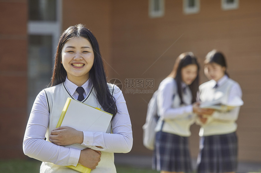 前视图背包秘书高中生学习书本图片