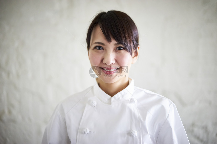 厨师的外套孤独的丰胸厨师肖像女人图片