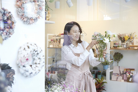 支架微笑笑花店年轻女子韩国人图片