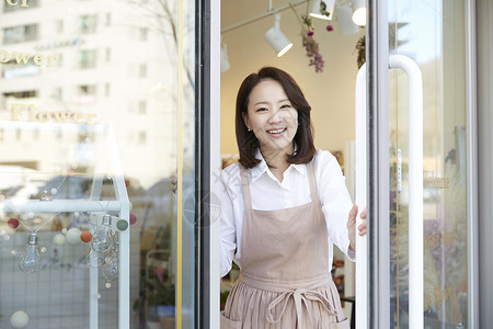 新生代职业的窗花店年轻女子韩国人背景图片