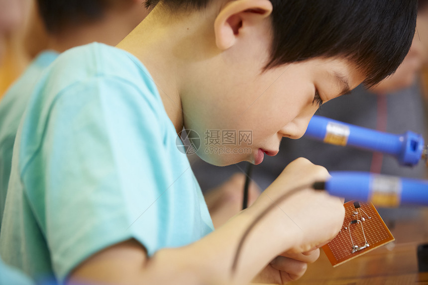 学习机动亚洲人儿童工作坊图片