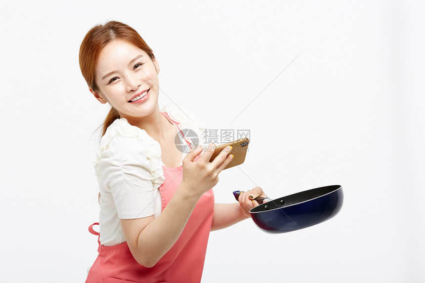 烹饪美食的女性肖像图片