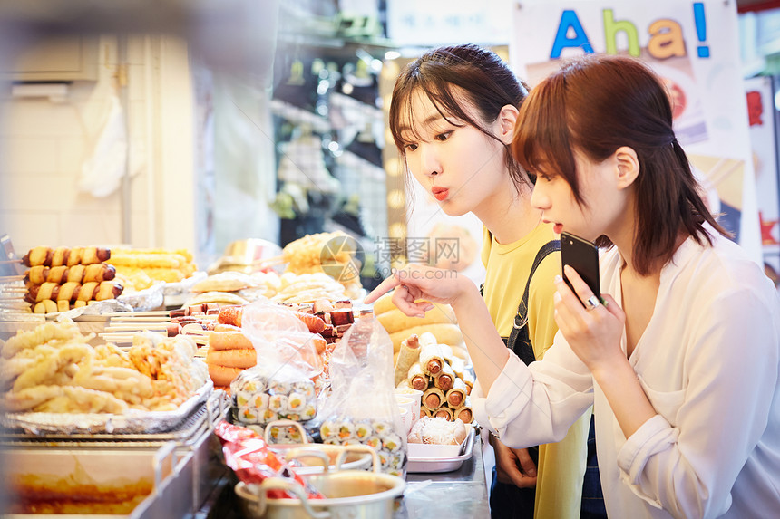 顺序女人韩流韩国女旅游街头食品图片