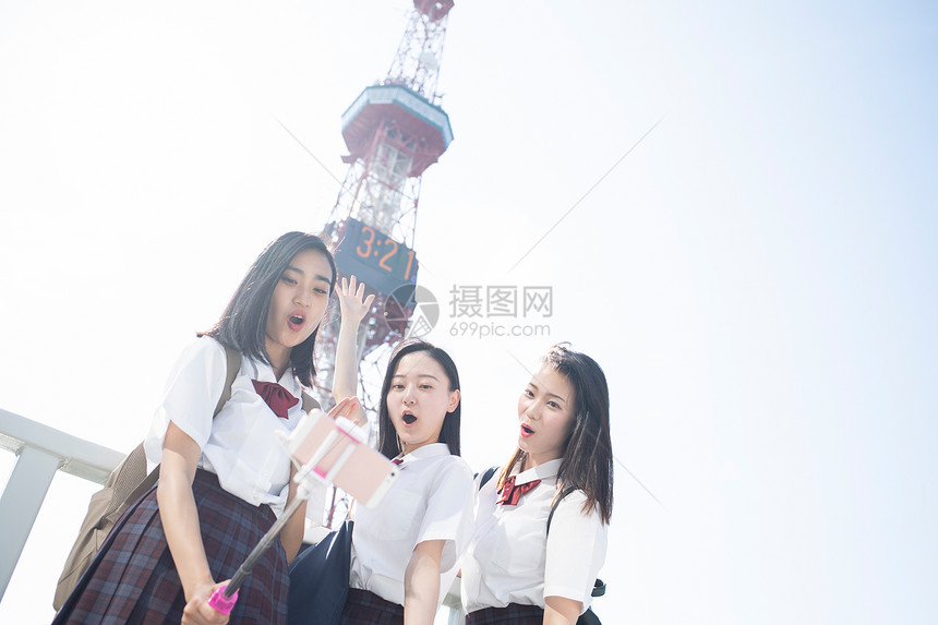 城镇地区图画美丽女学生札幌学校旅行电视塔图片