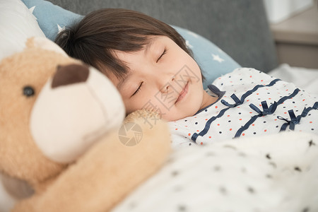 早晨小孩安静的睡眠睡在床上的孩子图片