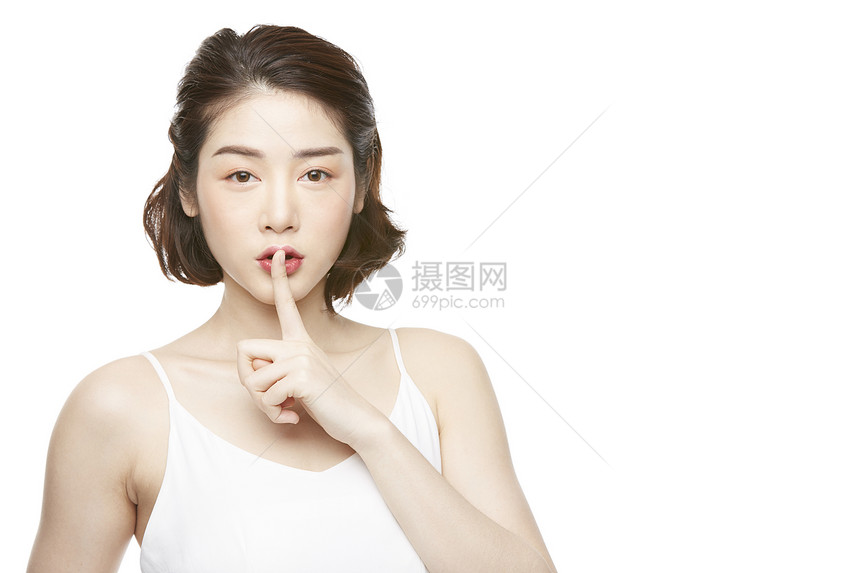 美妆女性比手势微笑图片