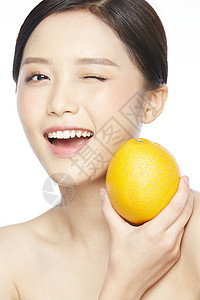 美妆活力少女与橙子图片