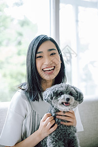 亚洲宠物狗大学生生活与狗女人图片