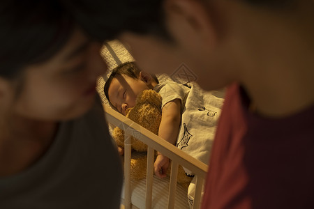洋娃娃儿童保育父母家庭妈妈爸爸幼儿床背景图片