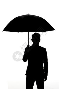 商务男性撑伞剪影图片