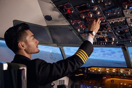 机舱驾驶室男性飞行员驾驶飞机背景