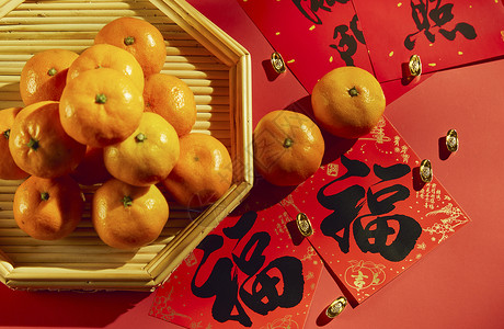 虎年春节对联年货橘子和福字背景
