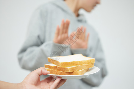 伸手女人谷物过敏的人伸手抗拒背景