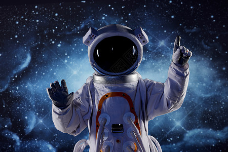 创意宇航员触碰虚拟屏幕高清图片