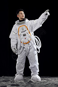 宇航员手指前方背景图片