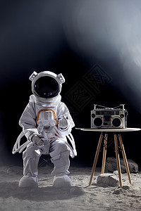 宇航员听收音机背景图片